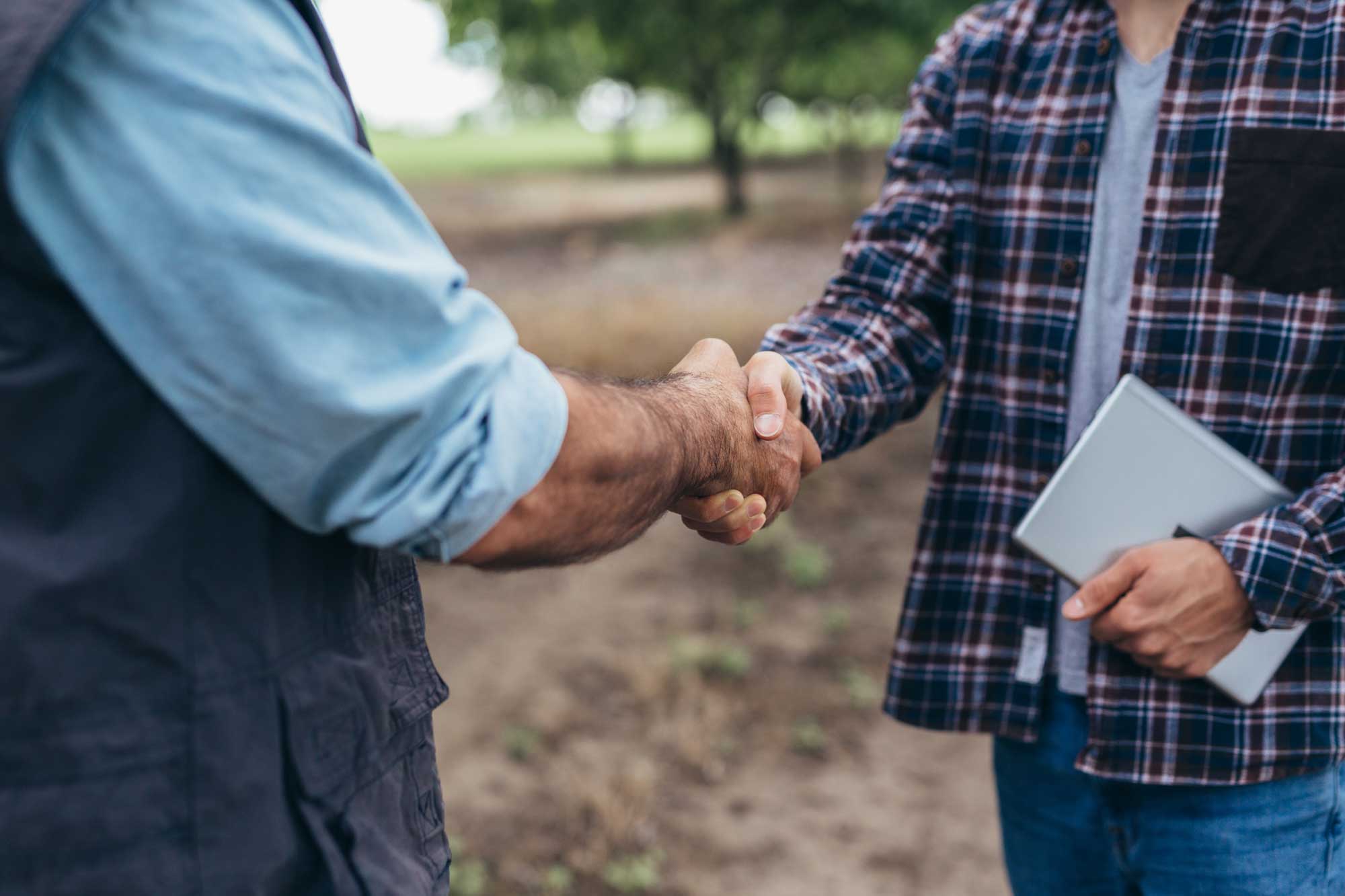 close up of people shaking hands